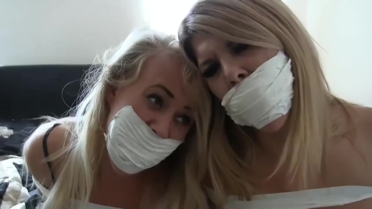 blonde women got tied up by a burglar who just wanted to see those big boobs poster