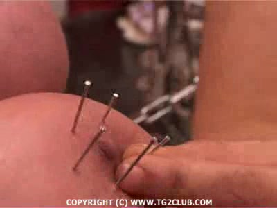 master shoves sharp needles in her massive bonded boobs poster